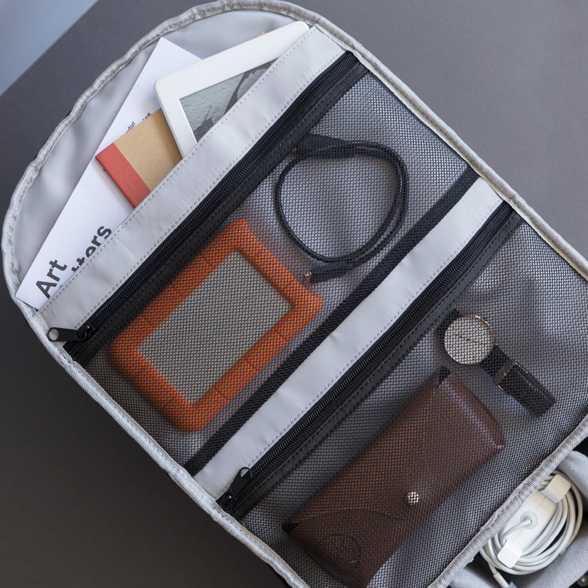 Pack your loose tech gear in the mesh pockets - camera backpack