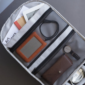 Pack your loose tech gear in the mesh pockets - camera backpack